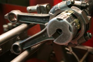 closeup-piston-rods-in-rod-reconditioning-machine