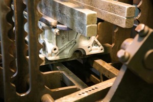 cylinder-head-in-pressure-testing-machine-end-view
